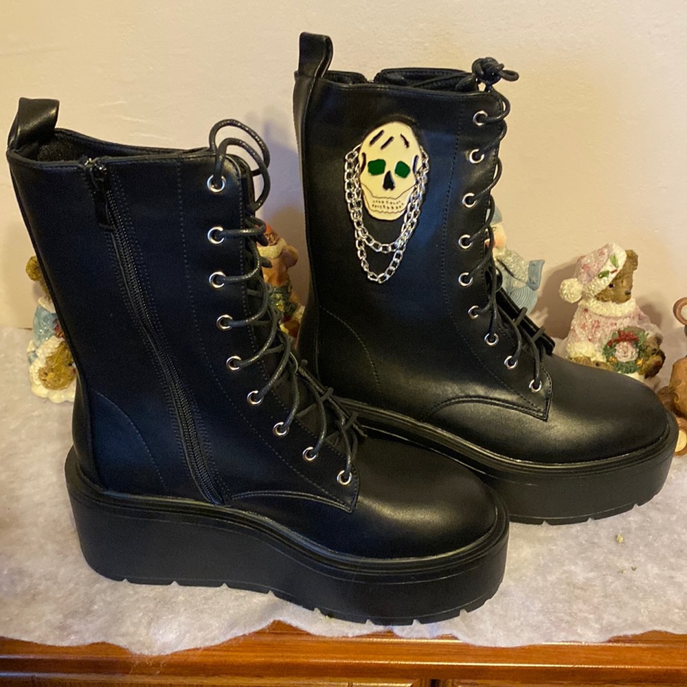 Brand New Not tried one Koi Black Combat Boots, with Skulls and chains on both.